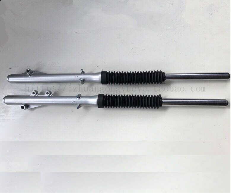Front shock absorbing and shock absorbing front shock absorbers for the Jialing cabbage cross-country locomotive for a pair of disc brakes