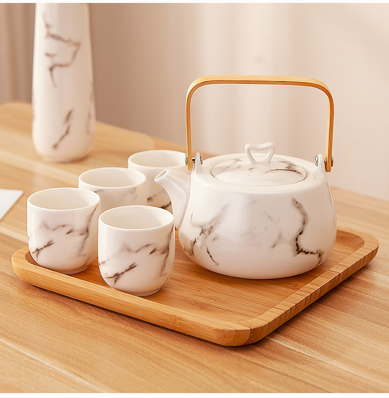 Japanese household kung fu tea sets suit ceramic water with the sitting room the teapot teacup kettle of water glass tea table