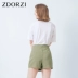 Zdorzi Zhuo Duo 2019 hè mới phiên bản Hàn Quốc của váy chống chói eo cao Một từ quần short mỏng không đều - Quần short