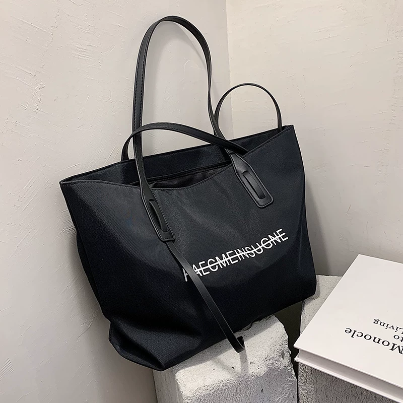 Demi-season capacious shoulder bag