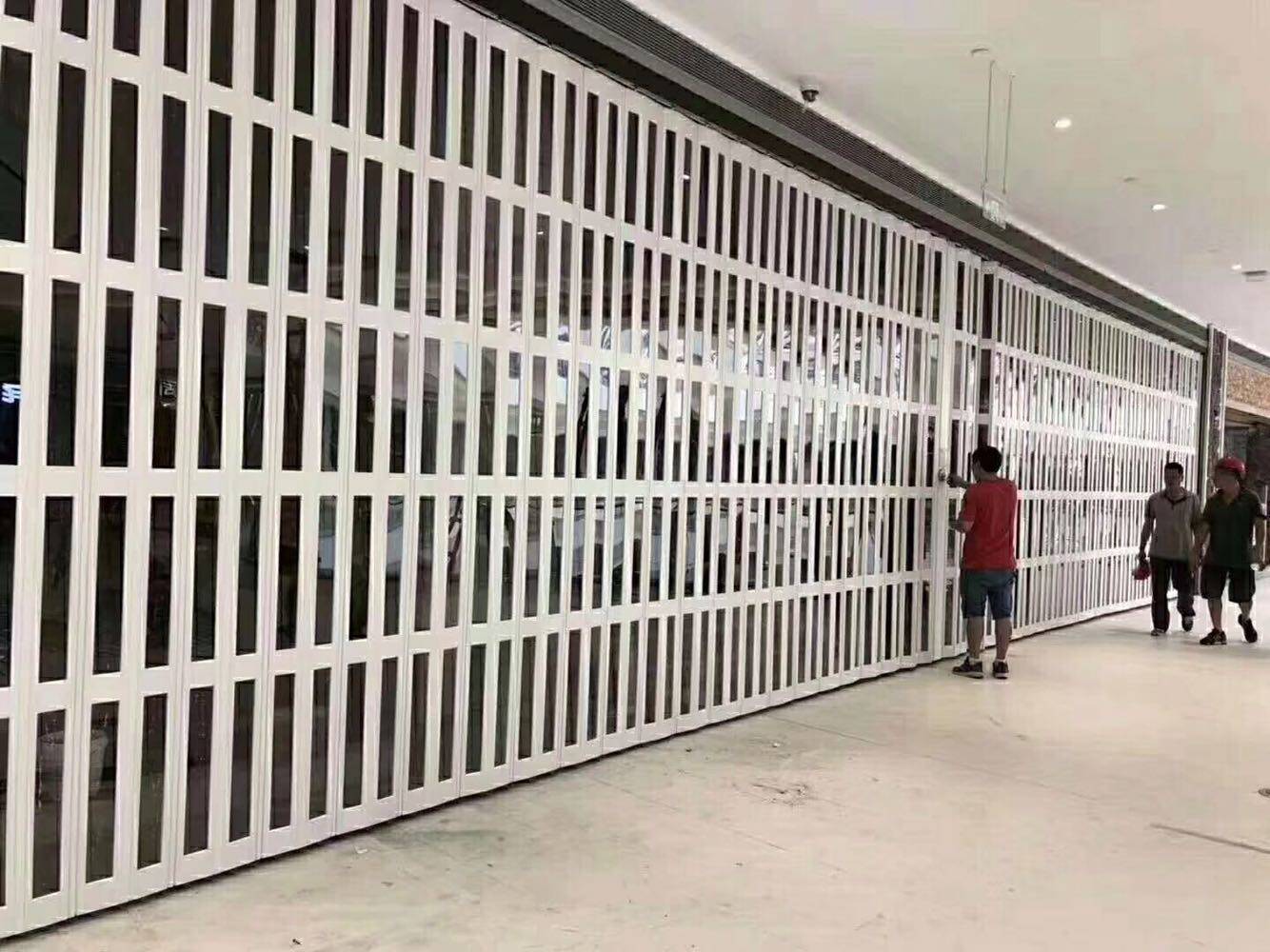 Folding door crystal sliding door aluminum alloy profile arc shopping mall plexiglass sliding door shopping mall door side electric