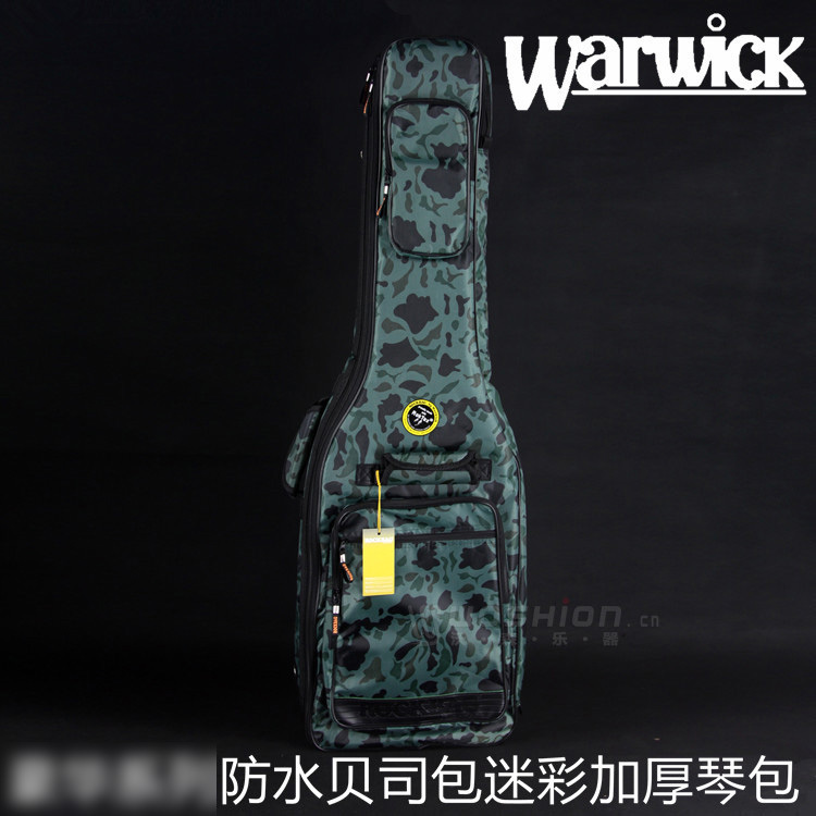 Holding the Wewarwick Rockbag 20505 Series waterproof thickened electric bass bag camouflak bass bag