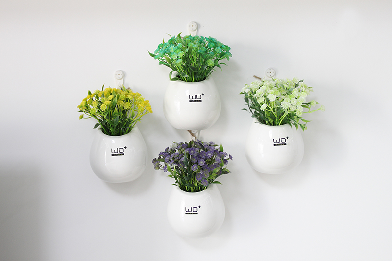 The Send + creative ceramic water infusion bag or bottle hanging vase flowerpot home furnishing articles metope adornment with simulation