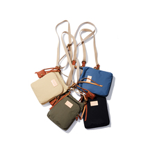 Japanese toleur womens bag mens bag small messenger mobile phone bag new spring and summer waterproof shoulder bag small bag