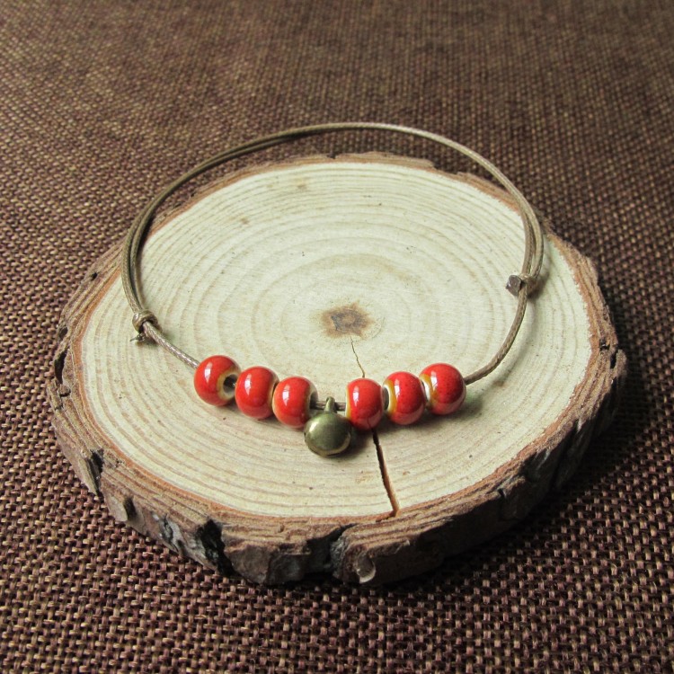 Dệt tay phong cách dân tộc retro vòng chân nữ chuông đơn giản Jingdezhen gốm trang sức nhỏ một nhân dân tệ bán buôn vòng đeo chân nữ
