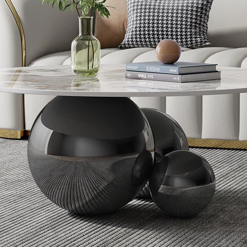 Итальянский светлый роскошный рок -плита Круглый гостиная дизайнер дизайнер специального чая для чая современный простой сферический шар из нержавеющей стали