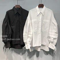 2020 autumn Korea ulzzang new solid color single breasted front short back long loose Korean fan lantern sleeve shirt women