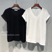 20 summer clothes new solid color hem bevel sleeves roll edge loose thin wild stitching design short-sleeved T-shirt women