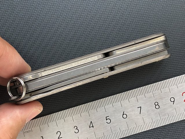Tc4 ມືຈັບ titanium 91mm Swiss Army Knife 1.3405 ສະບັບປັບປຸງແບບງ່າຍດາຍດັດແກ້ titanium handle titanium partition ເພື່ອເພີ່ມ pliers