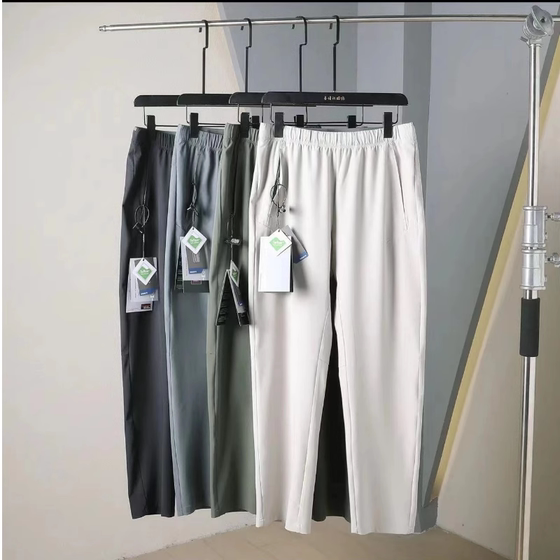 
Italian light luxury Leavo Johnson laser punched breathable men's spring and summer lightweight thin casual pants