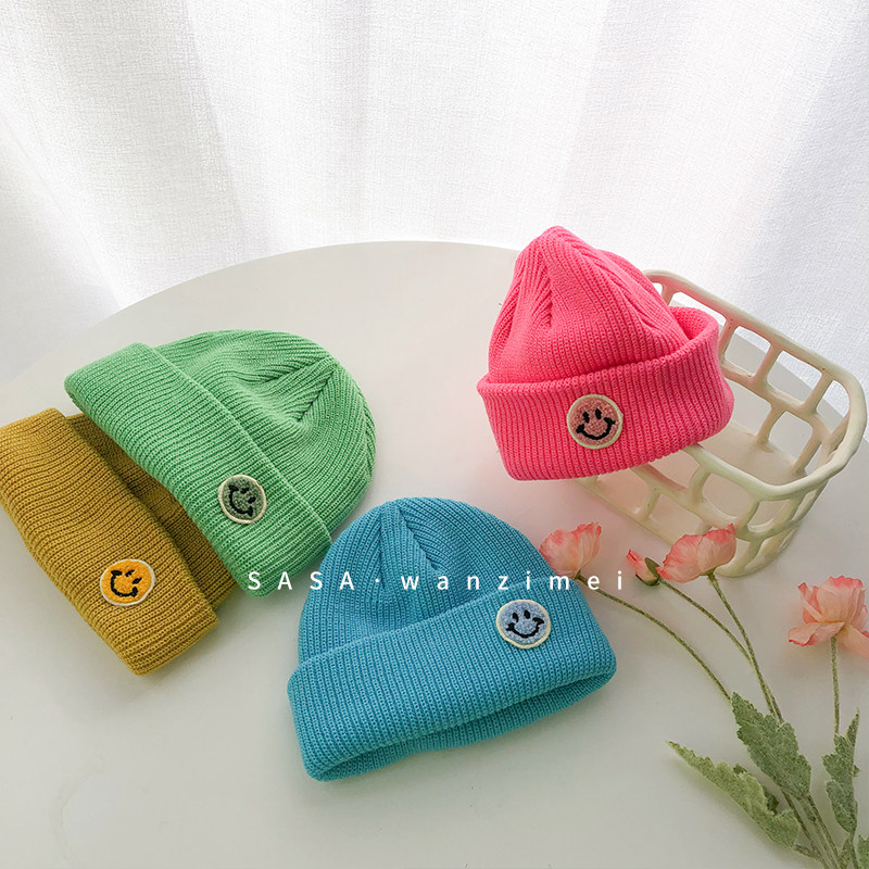 SASA's meatball girl Korean version of the early spring wool hat Children's fluorescent color smiley face cloth label melon skin hat