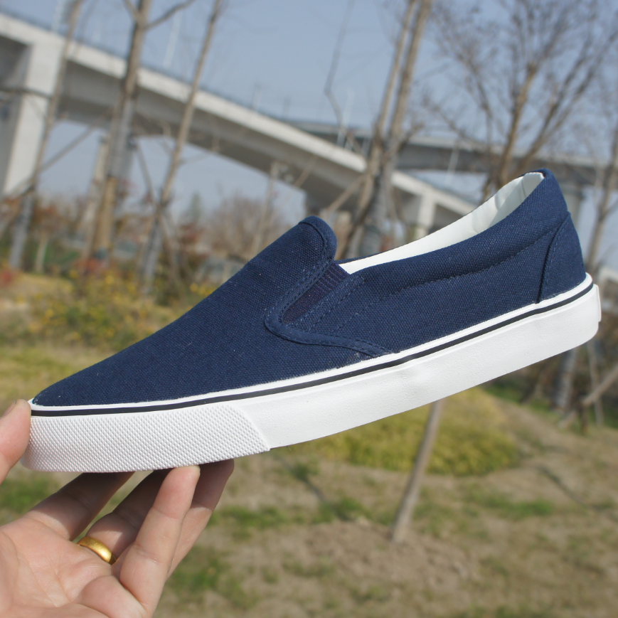 Qingdao Shuangxing men's and women's canvas black and white blue light one pedal low to help non-slip work shoes casual shoes