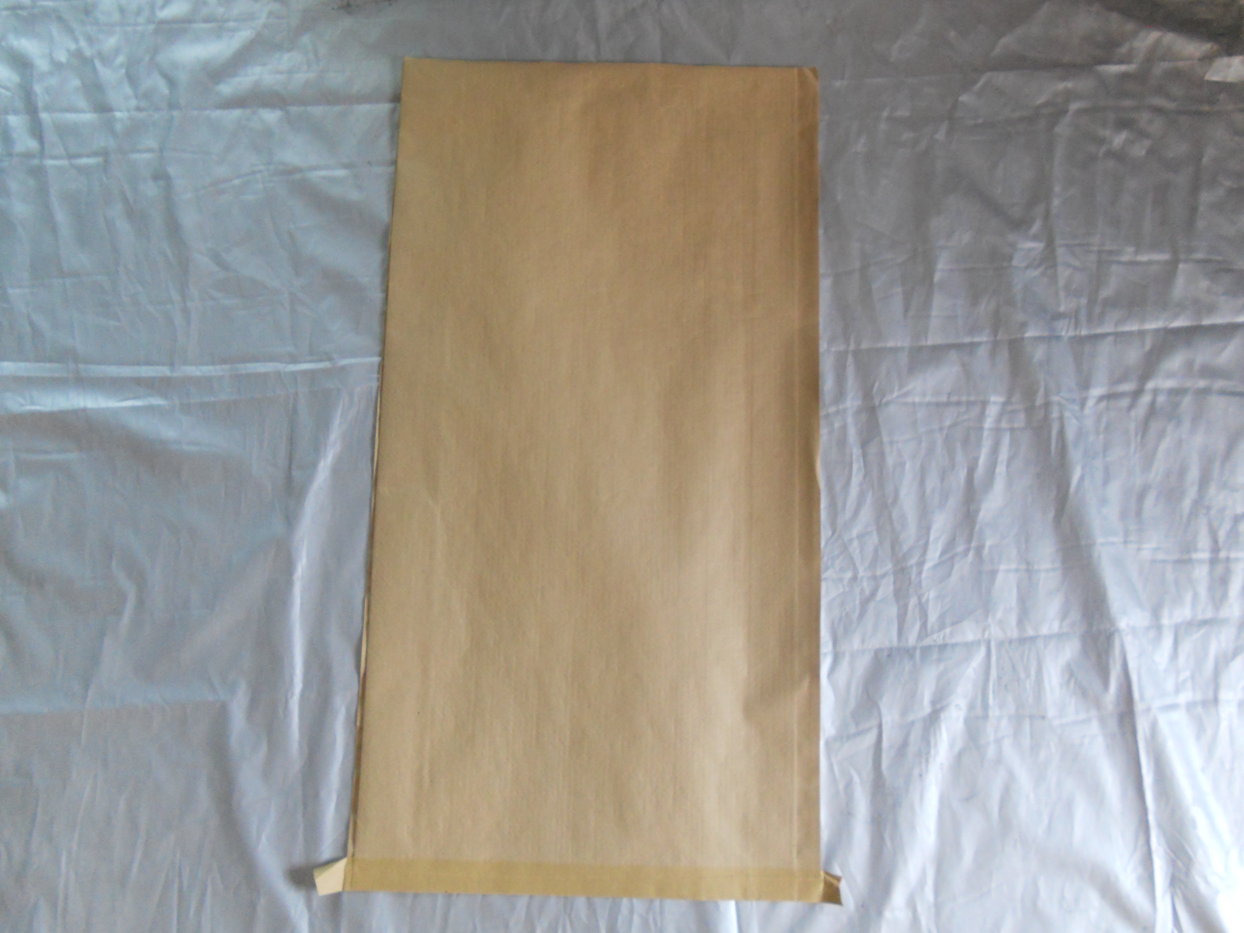 Manufacturer sales foreign yellow Inner white kraft paper bag paper plastic composite bag 25KG plastic granules packing bag 55 * 85