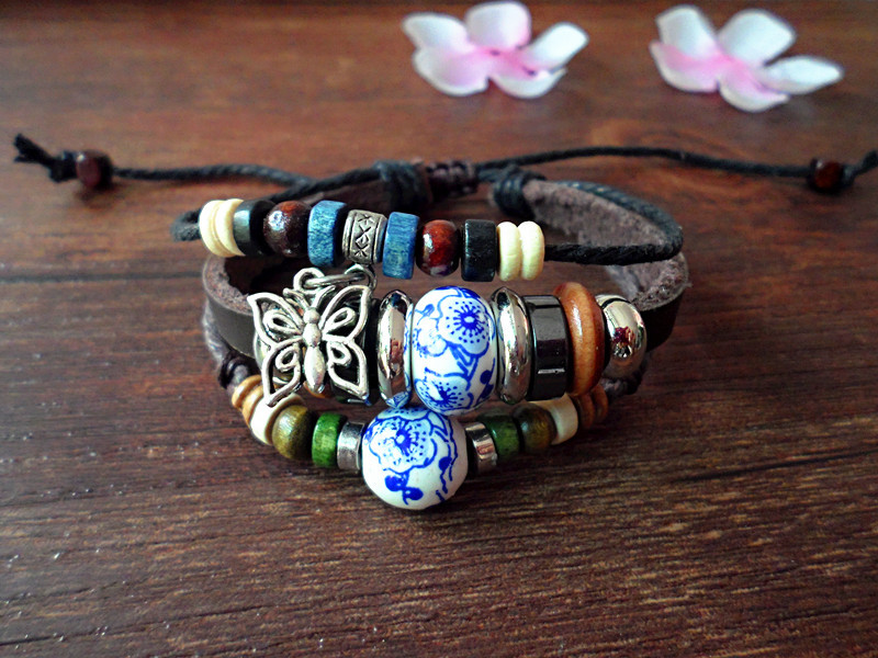 Vân Nam Tây Tạng trang sức gió dân tộc vòng tay retro pha lê hạt vòng tay dệt trang sức hoang dã nam nữ quà tặng nhỏ vòng tay gỗ sưa