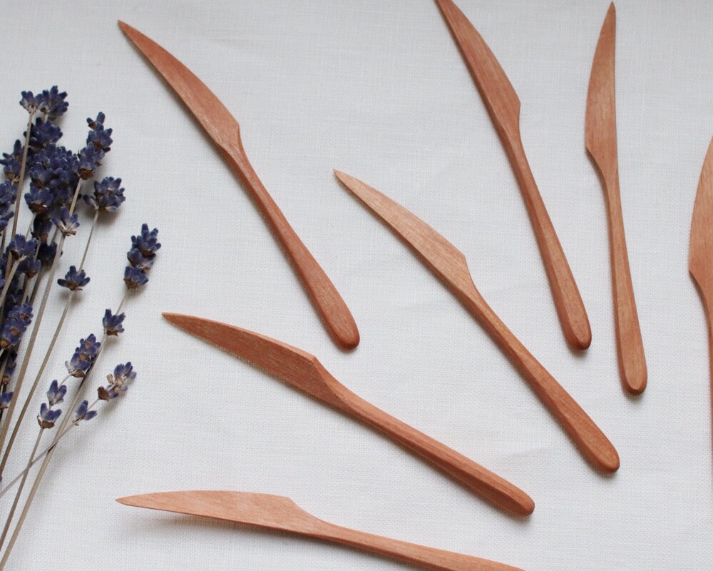 Japanese wood writer Otsuka and hand hand cherry - wood fruit cut