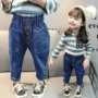 Cô gái mùa thu mới quần jeans hàn quốc 0 nữ bé 1-4 tuổi trẻ 5 cộng với quần nhung cao eo nước ngoài quần jean trẻ em cao cấp