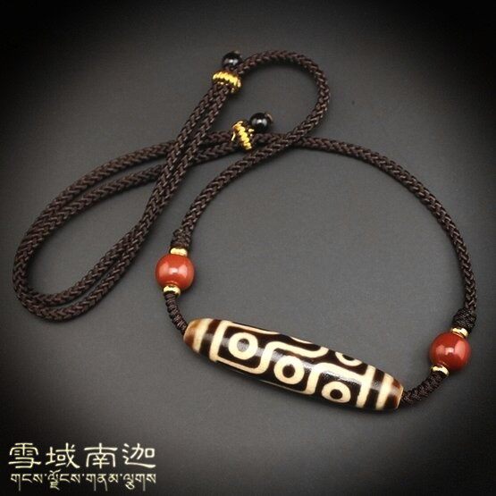 Tibet Tianzhu natural real products full of sand high oil moisturizing to pure nine eyes Old days Pearl cross section Lock Bone Pendant Necklace