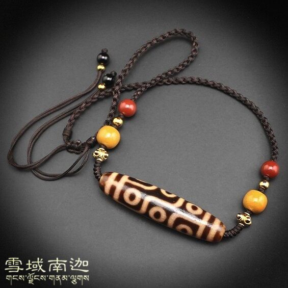 Tibet Tianzhu natural real products full of sand high oil moisturizing to pure nine eyes Old days Pearl cross section Lock Bone Pendant Necklace