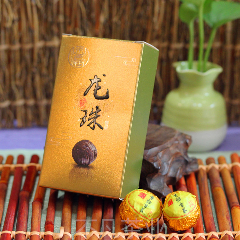 (Extraordinary tea Industry) Dragon Ball tea series Xi Guigui Dragon Ball Ancient Tree raw tea small Tuo 8 pieces paper box