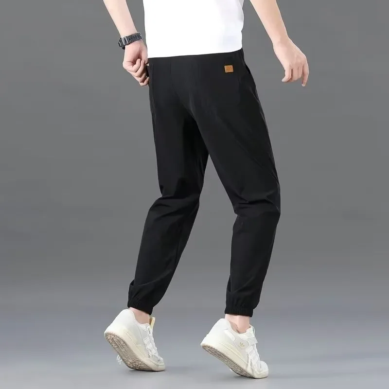 Sports pants solid color men's loose casual pants youth fashion fashion brand trendy cropped pants trendy simple summer