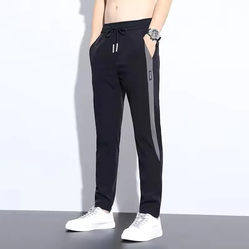 Men's new summer ice silk thin stretch casual trousers wear-resistant, dirt-resistant, loose straight sports pants breathable