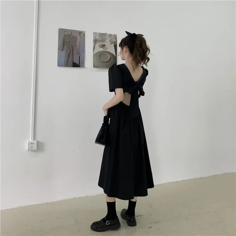 Summer thin Korean version puff sleeves with hollow bow on the back of the new loose and slim dress trendy