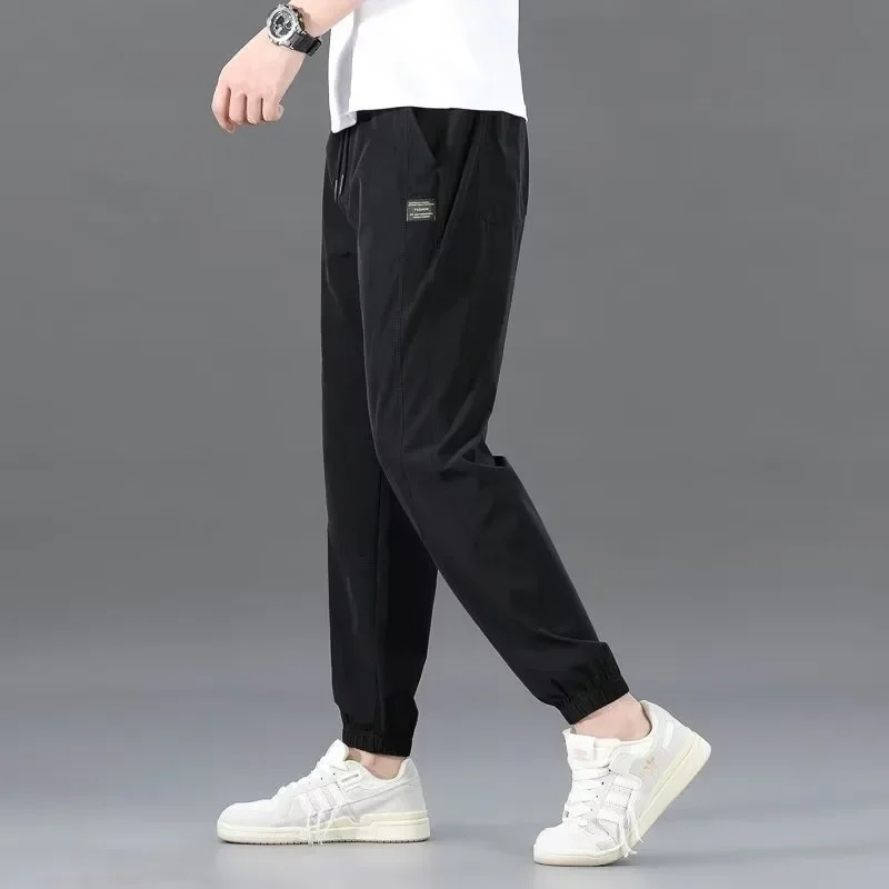 Sports pants solid color men's loose casual pants youth fashion fashion brand trendy cropped pants trendy simple summer