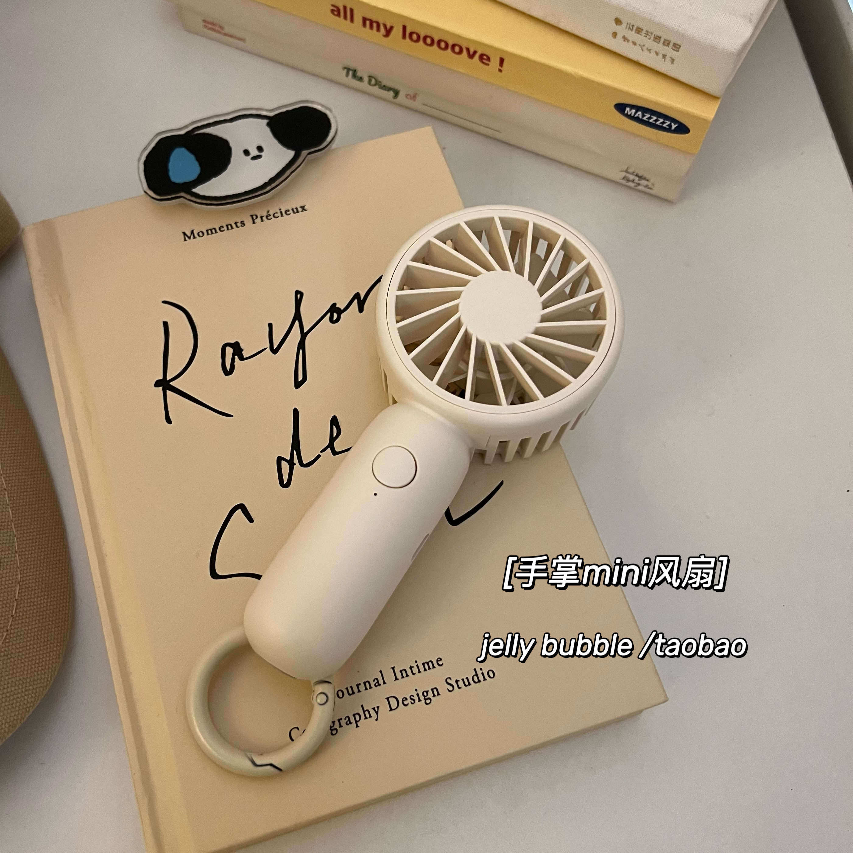 South Korea ins milk white simple mini portable mute usb electric fan small handheld usb charging fan