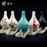 6 отверстий 12 отверстий Овальный Будда Рука держит белый керамический гуньян белый фарфоровый фарфор