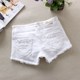 New women's white denim shorts spring and summer slimming elastic soft black mid-waist hot pants double button raw edge trouser legs