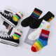 ຖົງຕີນເດັກນ້ອຍບໍລິສຸດຝ້າຍກາງ tube trendy socks spring, autumn and winter boys and girls smiley rainbow cute baby sports perspiration
