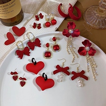 Earrings suitable for Chinese New Year wear this year pop new earrings cross year red beads ball ball winter with this life year