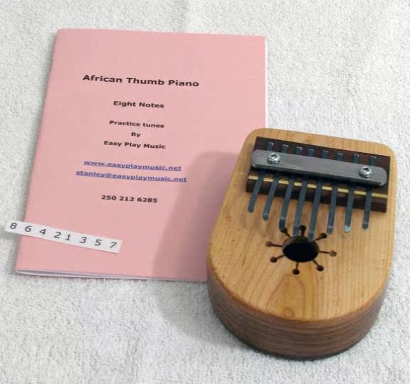 Canada Mua sắm Thumb ◇ Handmade Retro Đặc biệt Nhỏ Thumb Châu Phi Piano Walnut Nhạc cụ phương Tây đàn guitar mini