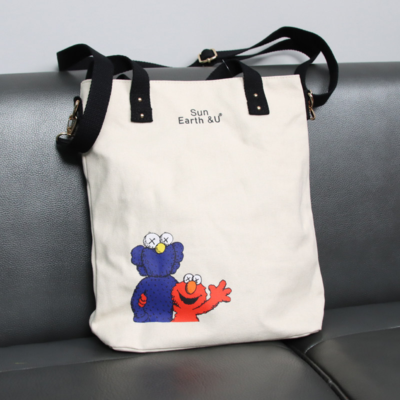 Super pretty bag~sun earth canvas ladies shoulder bag Japanese and Korean vertical cartoon messenger bag casual handbag