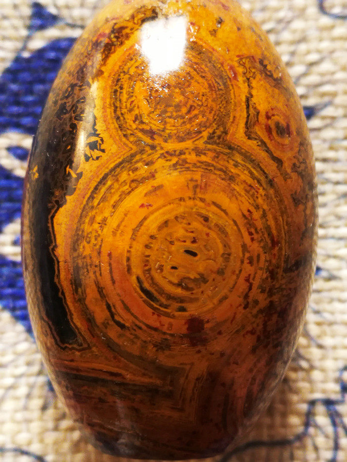 Meng Tianzhu nine-eye shale stone set line is beautiful (big belly Buddha big prayer wheel eye collection grade Alxa eye original stone