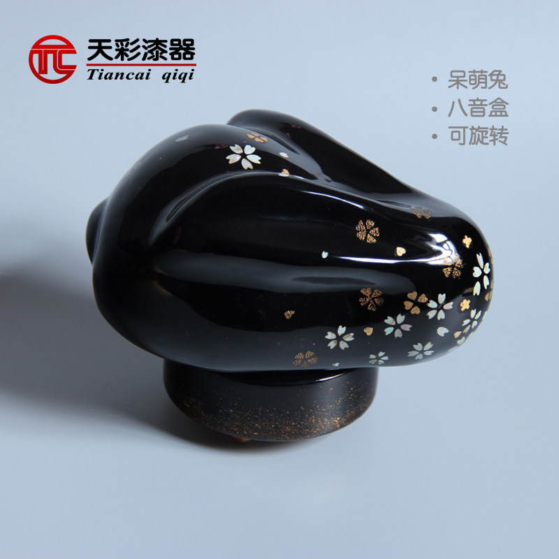 Large paint cartoon rabbit music box crafts wood tire inlaid with dill drawing bars on high rotating swing parts play