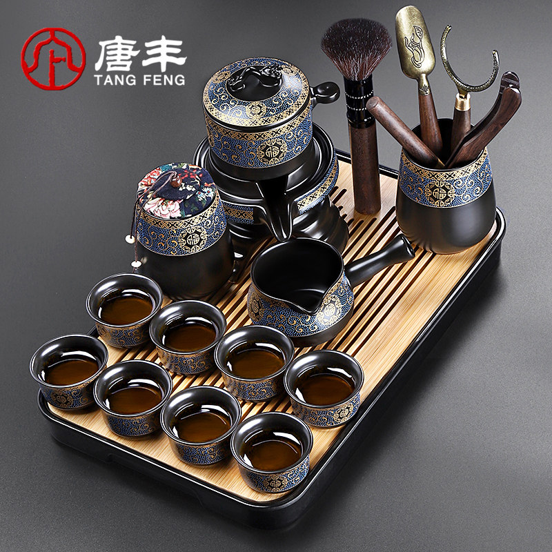 Kung Fu tea set small set home living room lazy automatic tea maker retro reception small tea table stone grinding rotating teapot
