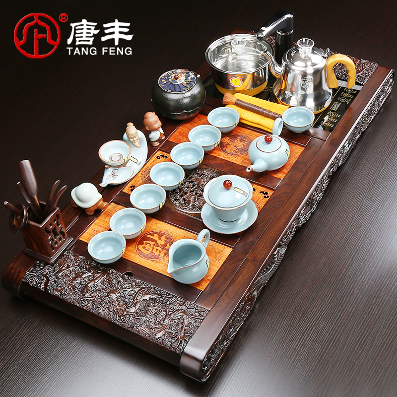 Tang Feng anaglyph ebony wood tea tray tea stove ceramic household utensils kunfu tea sea office suits for