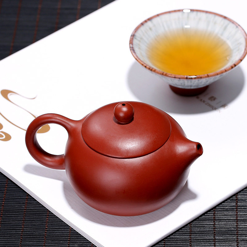 Yixing famous purple sand pot full handmade raw ore Dahongpao Xishi pot sketch 150ml Chinese ball hole bubble teapot