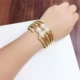 Big Pearl Fashion Tính cách hoang dã Vòng đeo tay lớn Kim loại Châu Âu và Mỹ Vòng đeo tay phóng đại Vòng tay áo len với trang trí đầu tiên Nữ tỳ hưu vàng