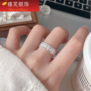 Pure silver 990 hollow filigree four-leaf clover sterling silver ring for women with retro design, high-end light luxury and versatile index finger ring