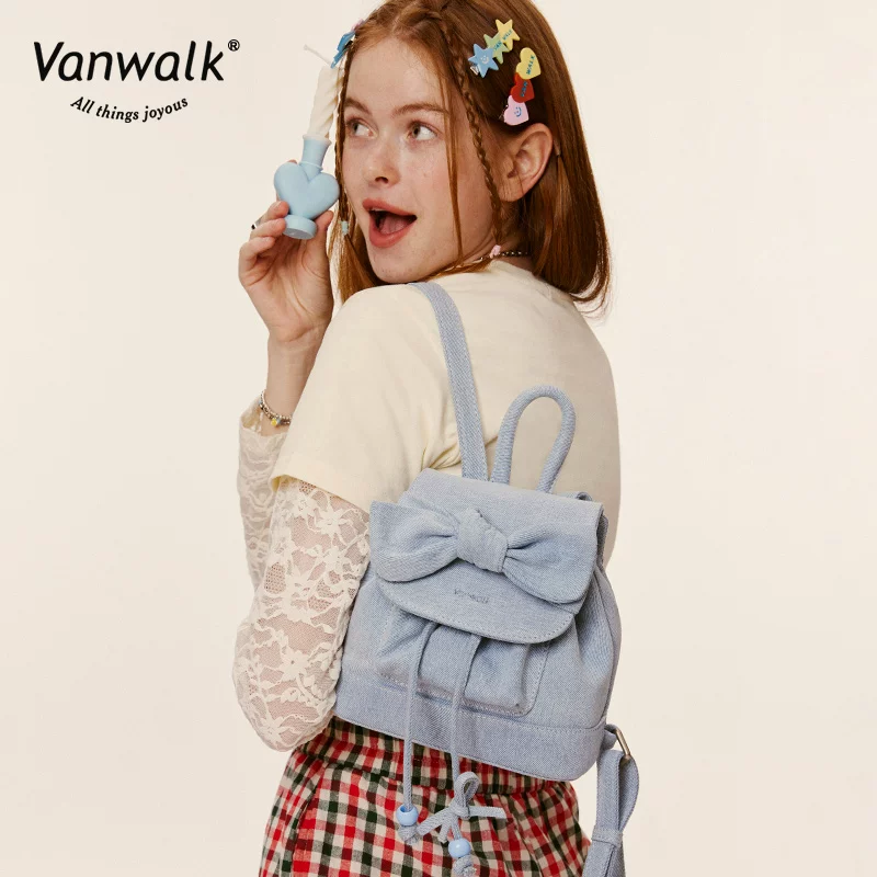 Genuine backpack, shoulder bag with bow