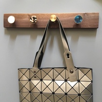 Light luxury wall hanger bedroom wall hanging rack living room entrance wall frame solid wood hanging hook log pure copper