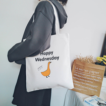 16 Anjia thick canvas bag student sail environmentally friendly portable shopping bag schoolbag simple Joker cartoon duckling bag