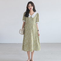 Pregnant woman with dress for a long time in the summer with a knee fashion turnemonic turnemonic light and warm air printed pregnant woman crushed floral dress