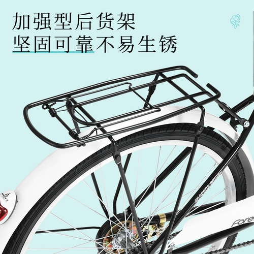 Постоянная ретро -коммутационная машина сплошной шины легкий взрослый мужчина -велосипед