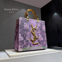 Hong Kong light luxury snake pattern handheld tote bag for women 2026 new high-end autumn and winter large capacity commuting bag