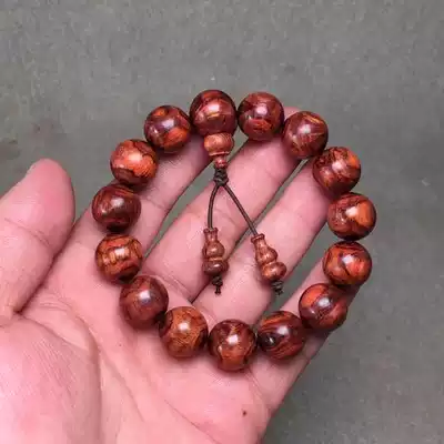 Hainan Huanghuali old material Kang pear purple oil pear 15 pairs of eyes, beads, hand string, tiger skin pattern grimace grimace, man and woman