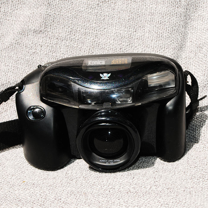 Curica supper zoom35-105mm glued to the camera roll camera