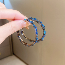 Silver needle inlaid with diamond twist wrapped hoop earrings for women European and American exaggerated high-end earrings blue ear jewelry trend